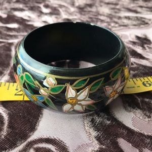 Black bangle with hand painted flowers.